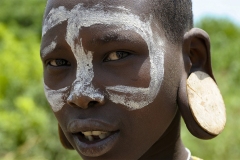 Mursi Boy with Face Paint Omo Valley Turmi Ethiopia