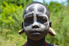 Young Mursi Warrior with Ears Plate Omo Valley Turmi Ethiopia