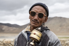 Nomad Changpa Man with Prayer Wheel Tsokara Area Ladakh India