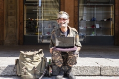 Homeless with Laptop Major Square Bologna Italy